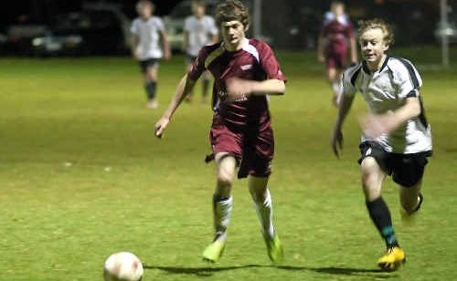 Luke Dargan (centre) on the attack for the Warwick Wolves in a 2-1 grand-final loss to West Wanderers in colts football. Luke Dargan (centre) on the attack for the Warwick Wolves in a 2-1 grand-final loss to West Wanderers in colts football.